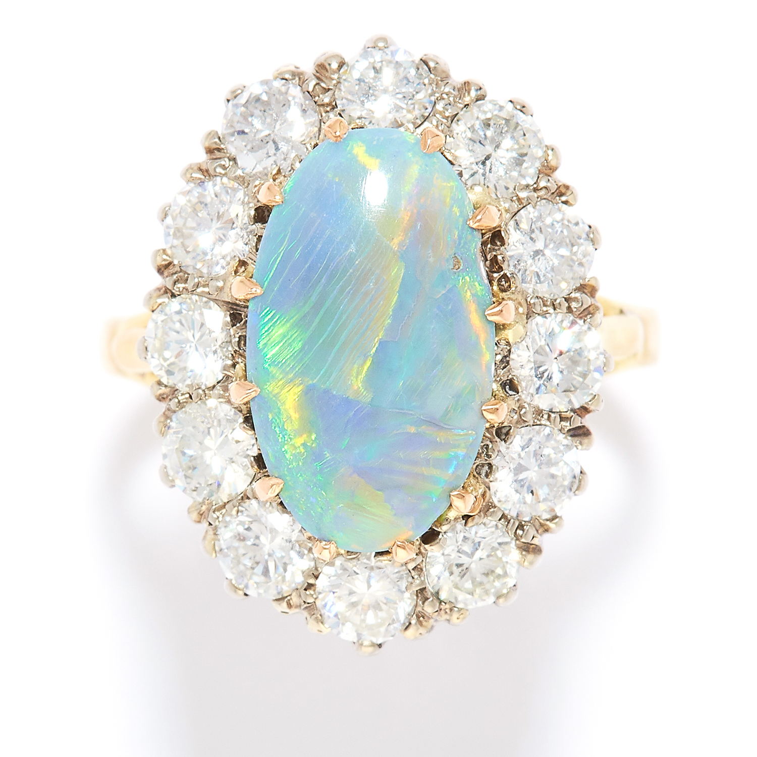 OPAL AND DIAMOND CLUSTER RING in high carat yellow and white gold, the oval cabochon opal of 2.65