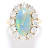 OPAL AND DIAMOND CLUSTER RING in high carat yellow and white gold, the oval cabochon opal of 2.65