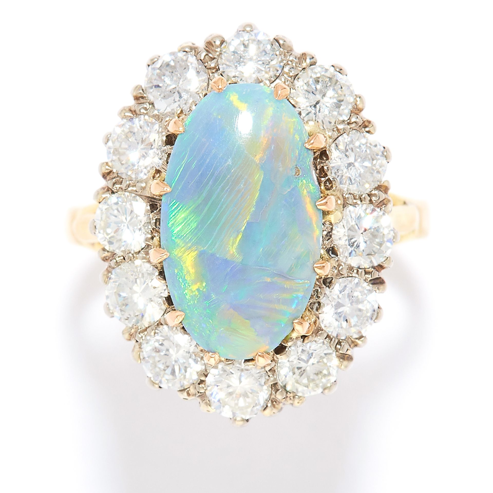 OPAL AND DIAMOND CLUSTER RING in high carat yellow and white gold, the oval cabochon opal of 2.65