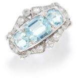 AQUAMARINE AND DIAMOND RING in platinum or white gold, set with a trio of cushion and oval cut