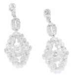 ANTIQUE DIAMOND EARRINGS in 18ct white gold, each set with a principal old cut diamond between