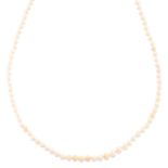 PEARL NECKLACE in 14ct white gold, comprising of a single strand of pearl beads, stamped K14, 156cm,