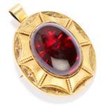 ANTIQUE GARNET MOURNING PENDANT / BROOCH, 19TH CENTURY in high carat yellow gold, set with an oval