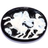 CARVED CAMEO JEWEL depicting a scene of a warrior and a horse rider, 5.6cm.