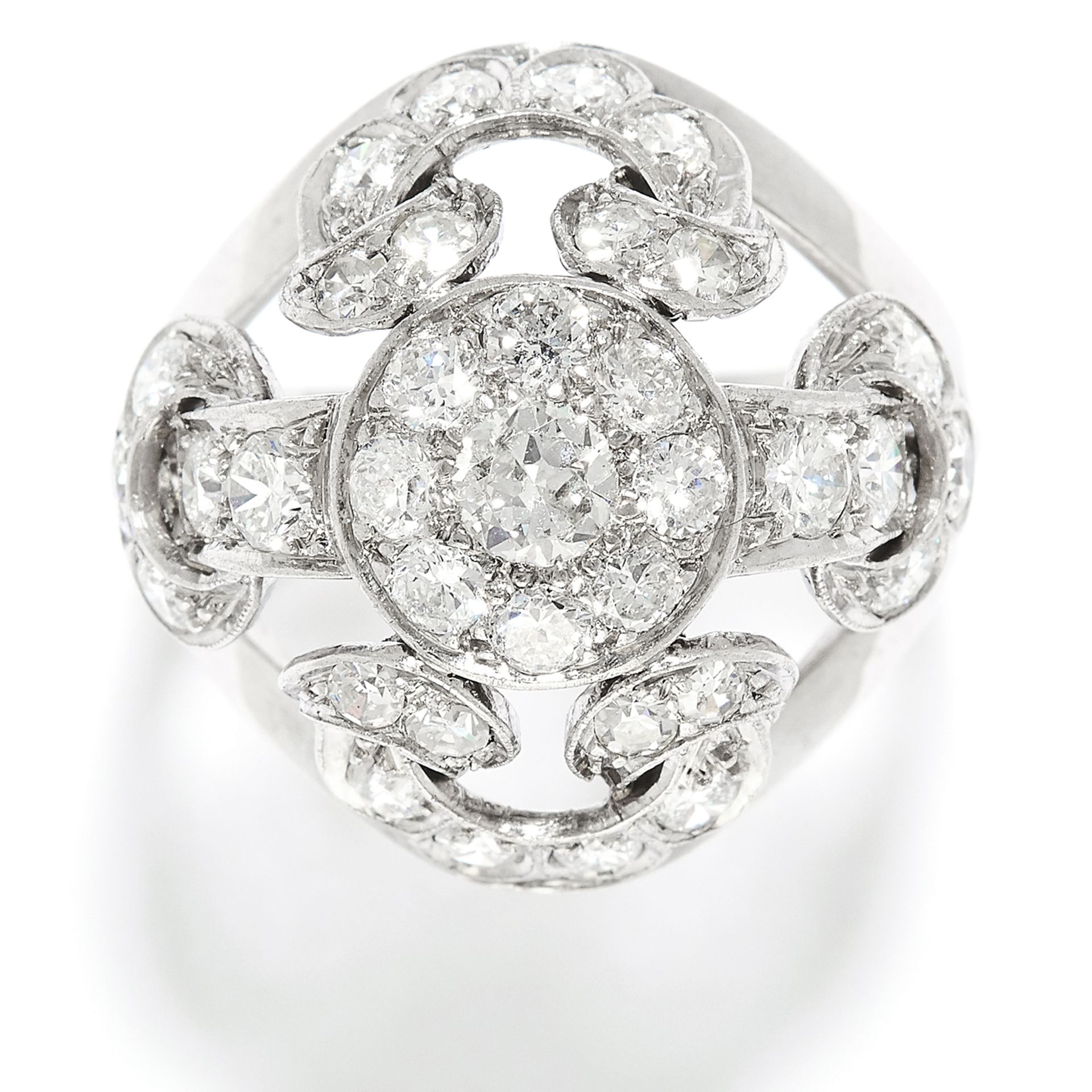 DIAMOND DRESS RING in platinum or white gold, bombe form with openwork scroll design, jewelled