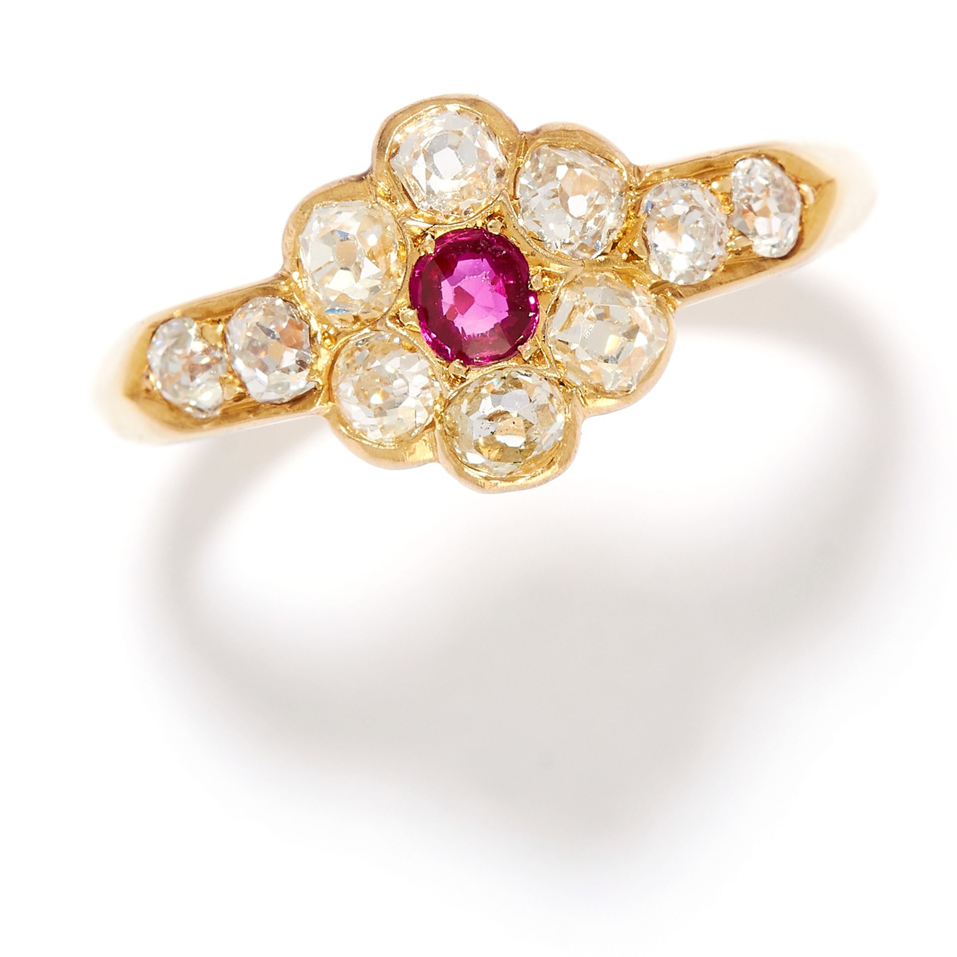 ANTIQUE RUBY AND DIAMOND RING in 18ct yellow gold, comprising of a cushion cut ruby in a cluster