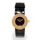 LADIES WRISTWATCH, CHANEL in 18ct yellow gold, with black dial in gold border engraved with '
