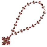 ANTIQUE GARNET AND HAIRWORK MOURNING PENDANT NECKLACE in yellow gold, set with pear, oval and