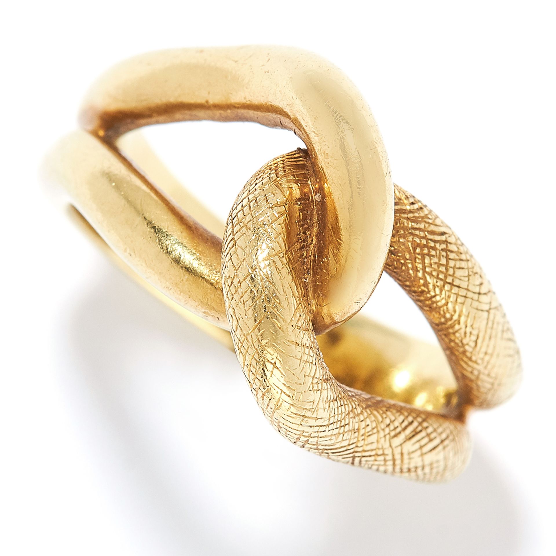 KNOT RING, TIFFANY AND CO in 18ct yellow gold, depicting a textured open knot, signed Tiffany &