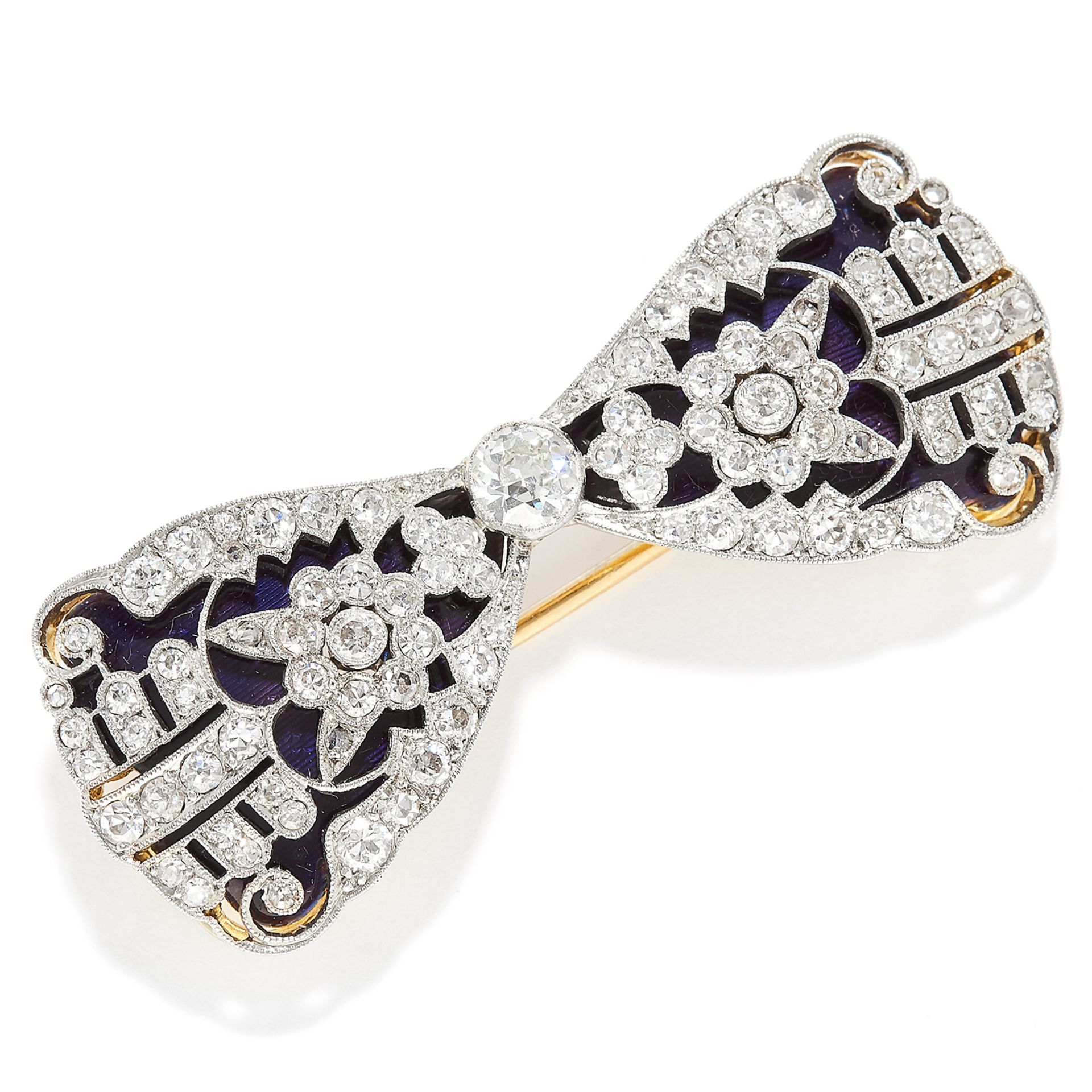 ANTIQUE DIAMOND AND ENAMEL BOW BROOCH / PENDANT in yellow gold and platinum, depicting a bow set