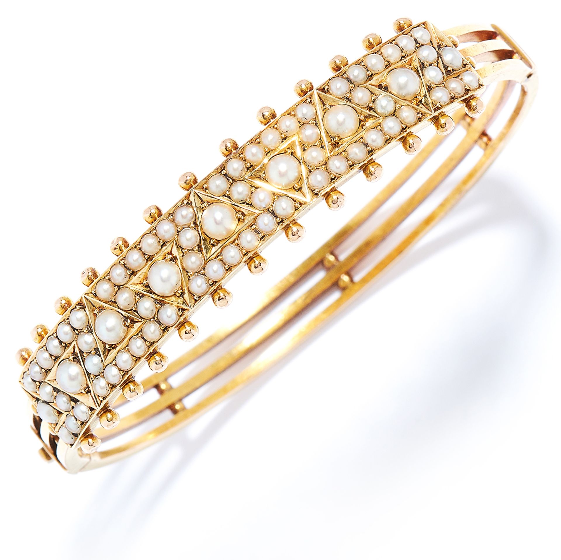 ANTIQUE SEED PEARL BANGLE in high carat yellow gold, set with rows of seed pearls, unmarked, 5.5cm