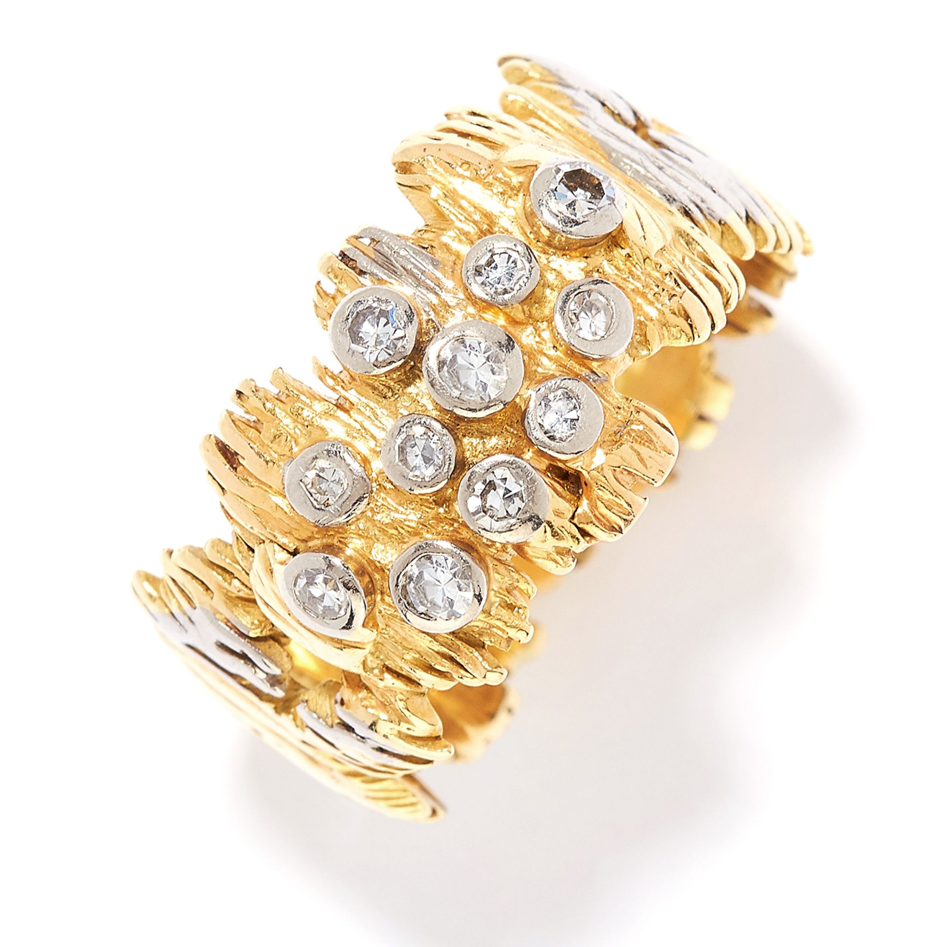 DIAMOND RING, CHARLES DE TEMPLE, 1966 in 18ct yellow and white gold, in textured pierce design set
