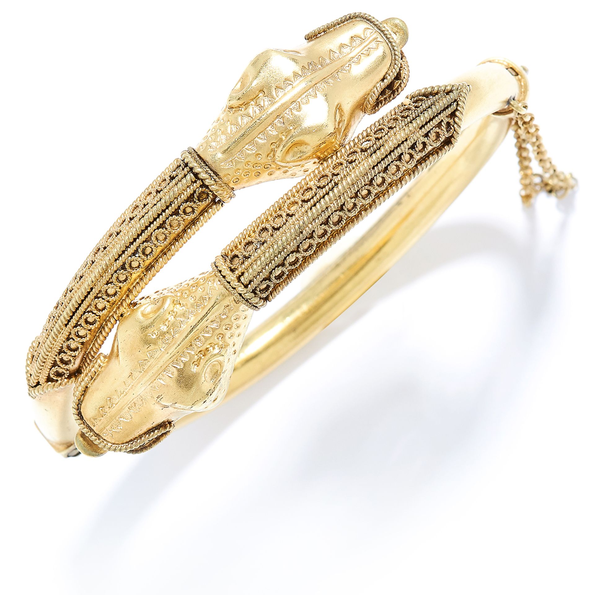ANTIQUE GOLD SNAKE / DRAGON BANGLE in high carat yellow gold, depicting two dragon heads coiling