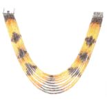 NINE STRAND SAPPHIRE BEAD AND DIAMOND NECKLACE in 18ct white gold, comprising of nine strands of