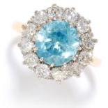 BLUE ZIRCON AND DIAMOND DRESS RING in yellow and white gold, the round cut zircon of 3.31 carats
