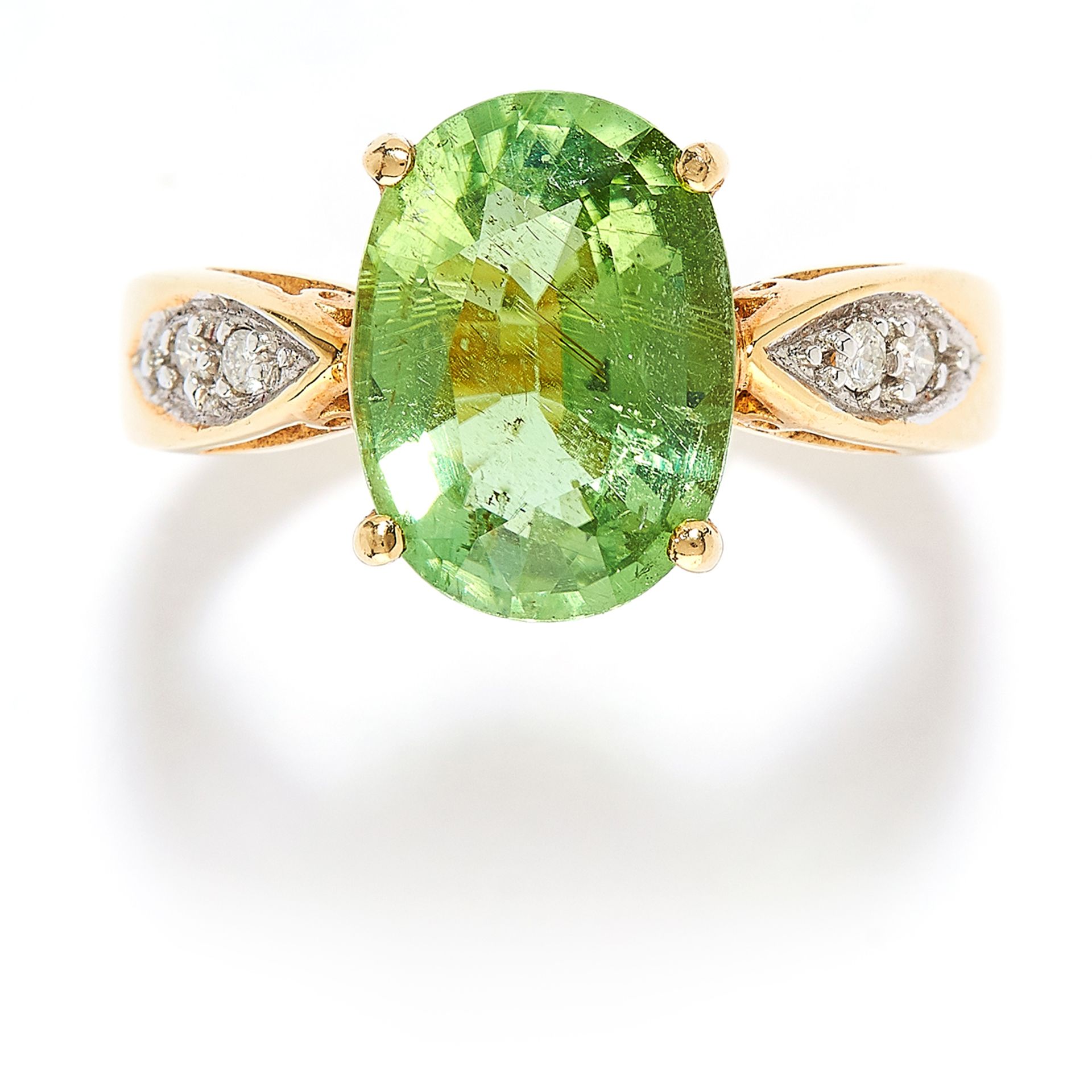 PARAIBA TOURMALINE AND DIAMOND RING in 18ct yellow gold, set with an oval cut paraiba tourmaline