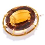 ANTIQUE 73.25 CARAT CITRINE BROOCH in high carat yellow gold, set with an oval cut citrine of