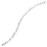 10.0 CARAT DIAMOND BRACELET, CARTIER in platinum, comprising of thirty round cut diamonds of various