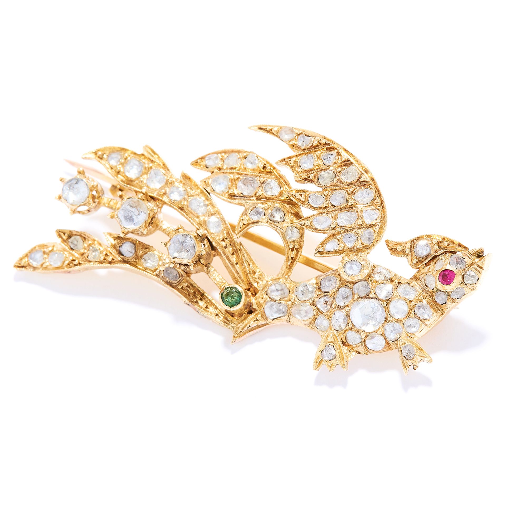 RUBY, EMERALD AND DIAMOND BIRD BROOCH in yellow gold, depicting a bird, set with a round cut ruby