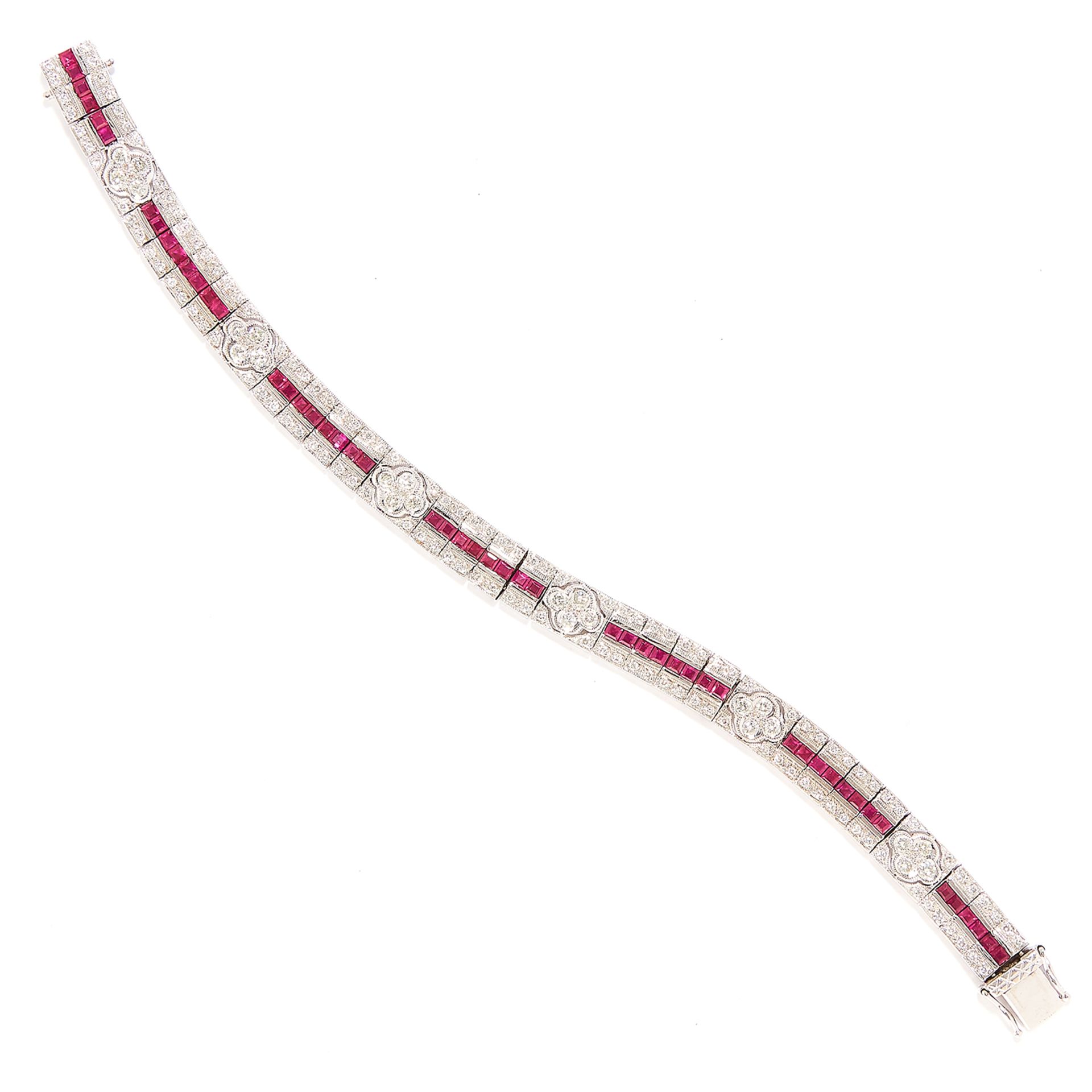 RUBY AND DIAMOND BRACELET in 18ct white gold, in Art Deco design set with step cut rubies