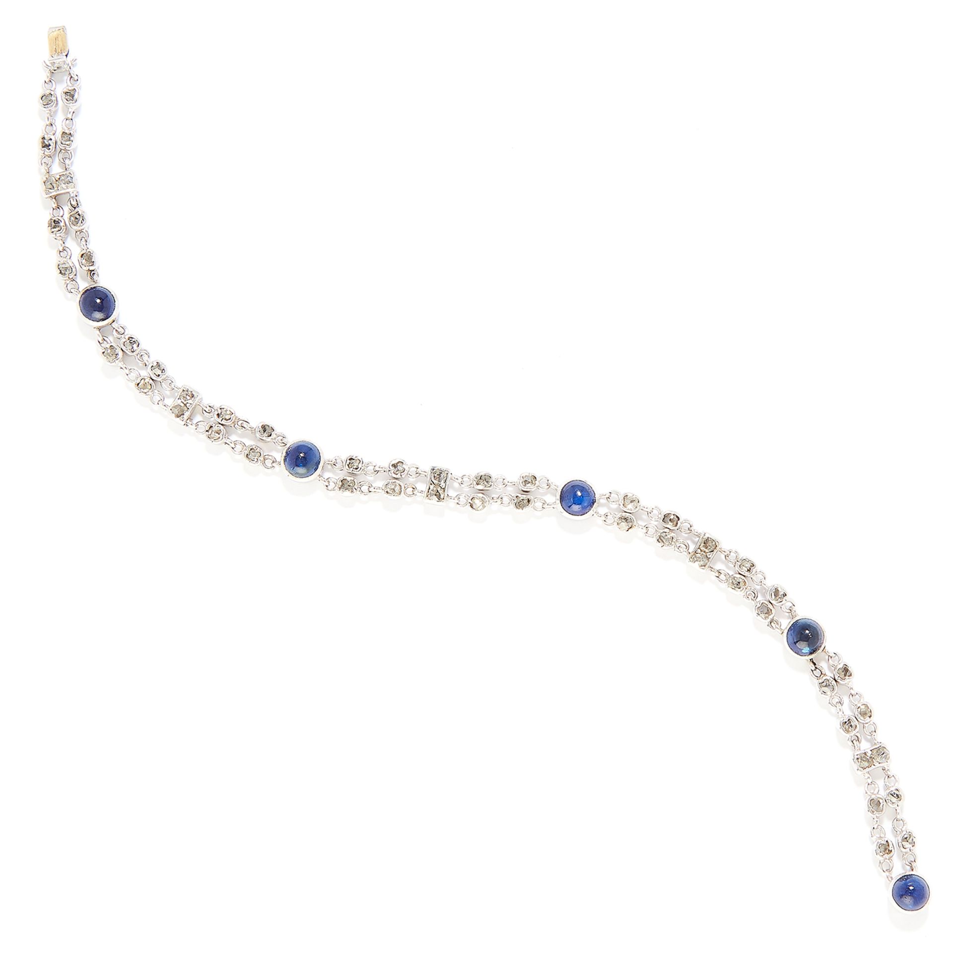 SAPPHIRE AND DIAMOND BRACELET in white gold or platinum, set with cabochon sapphire totalling