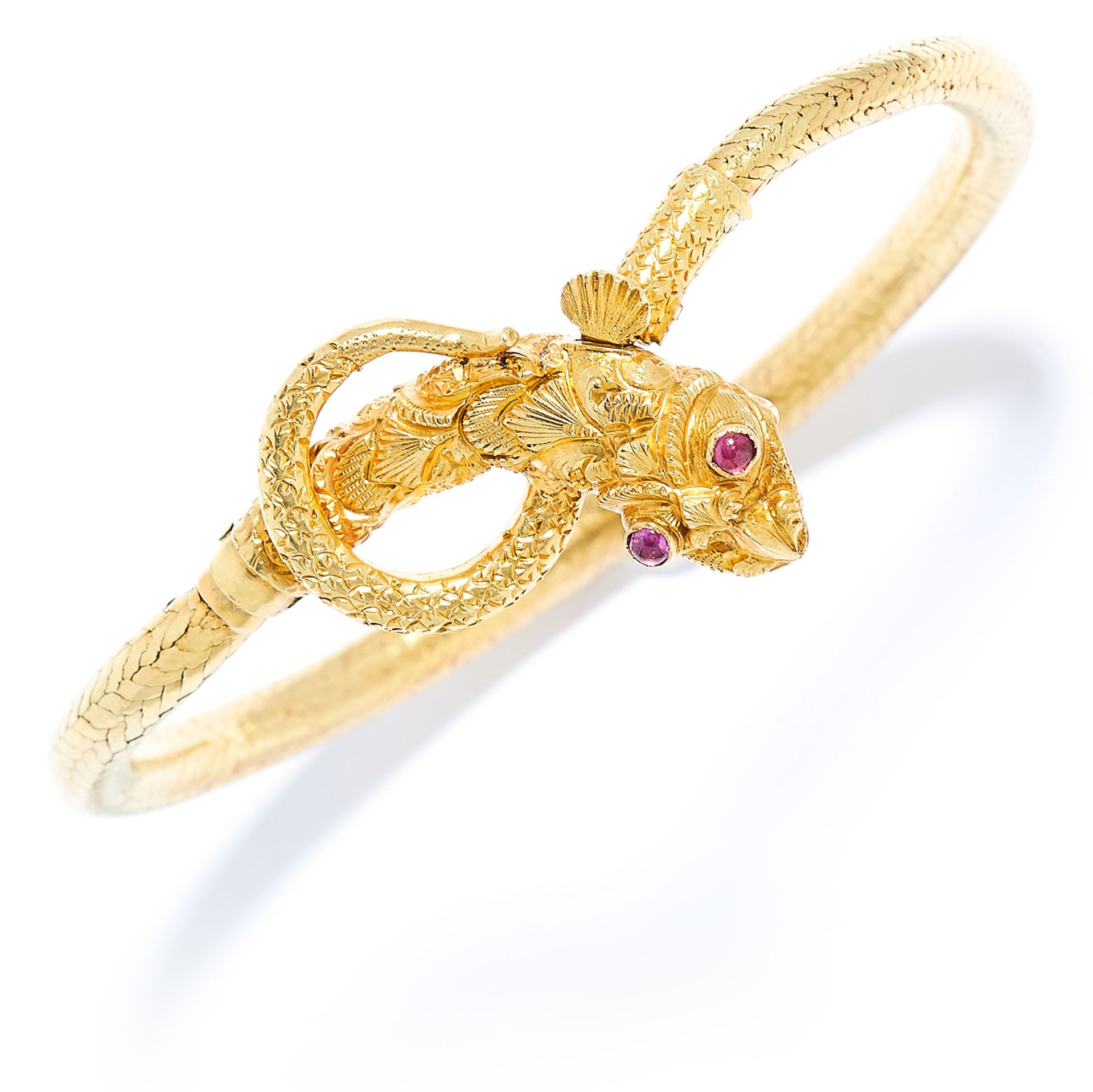 ANTIQUE RUBY SNAKE / SERPENT BANGLE in high carat yellow gold, depicting a dragon coiled around