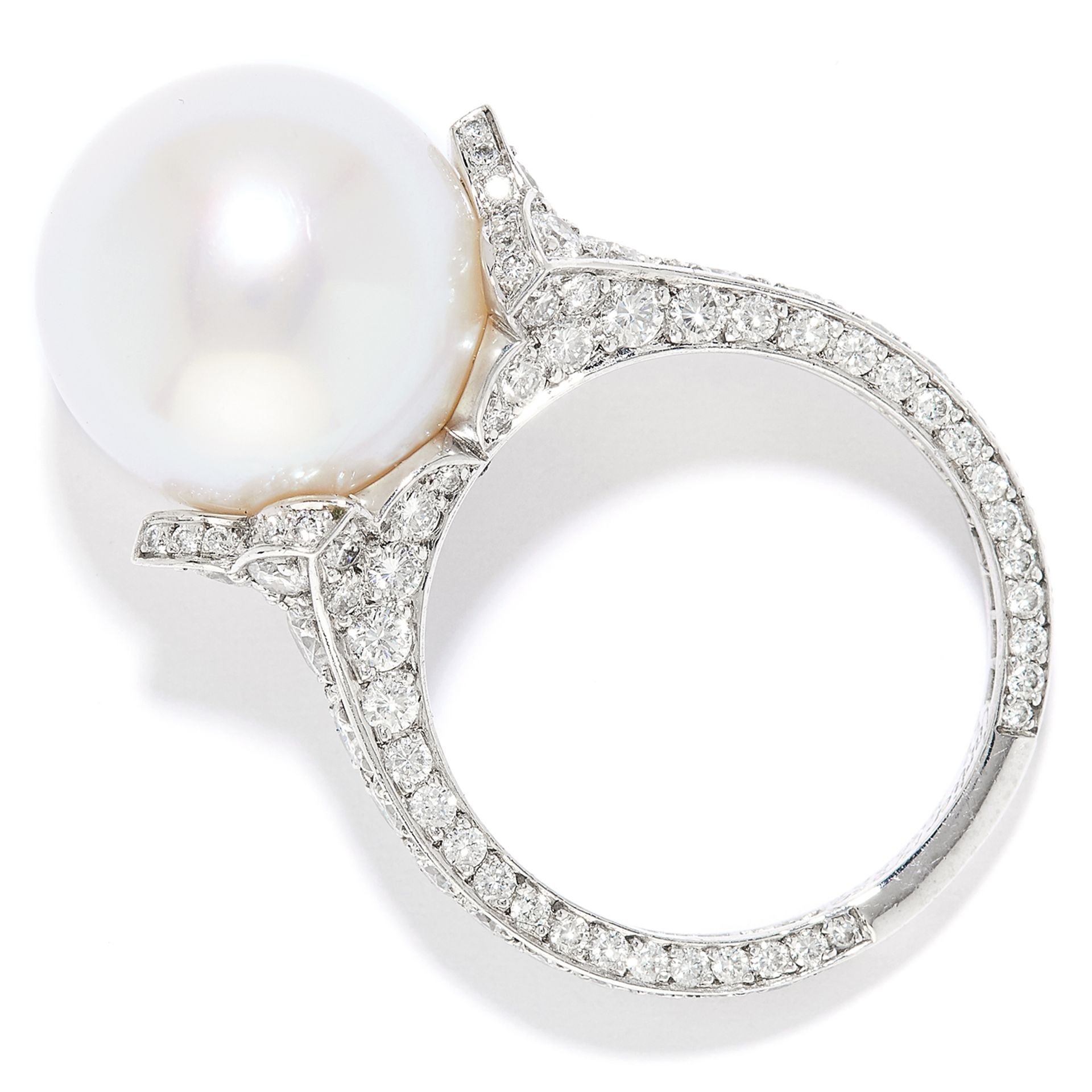 VINTAGE PEARL AND DIAMOND RING, CARTIER in platinum, set with a pearl of 12.9mm between floral