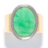 JADEITE JADE DRESS RING in 18ct yellow and white gold, set with an oval jade cabochon of 7.50