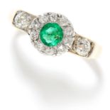 0.85 CARAT EMERALD AND DIAMOND RING in yellow gold, set with a round cut emerald of approximately