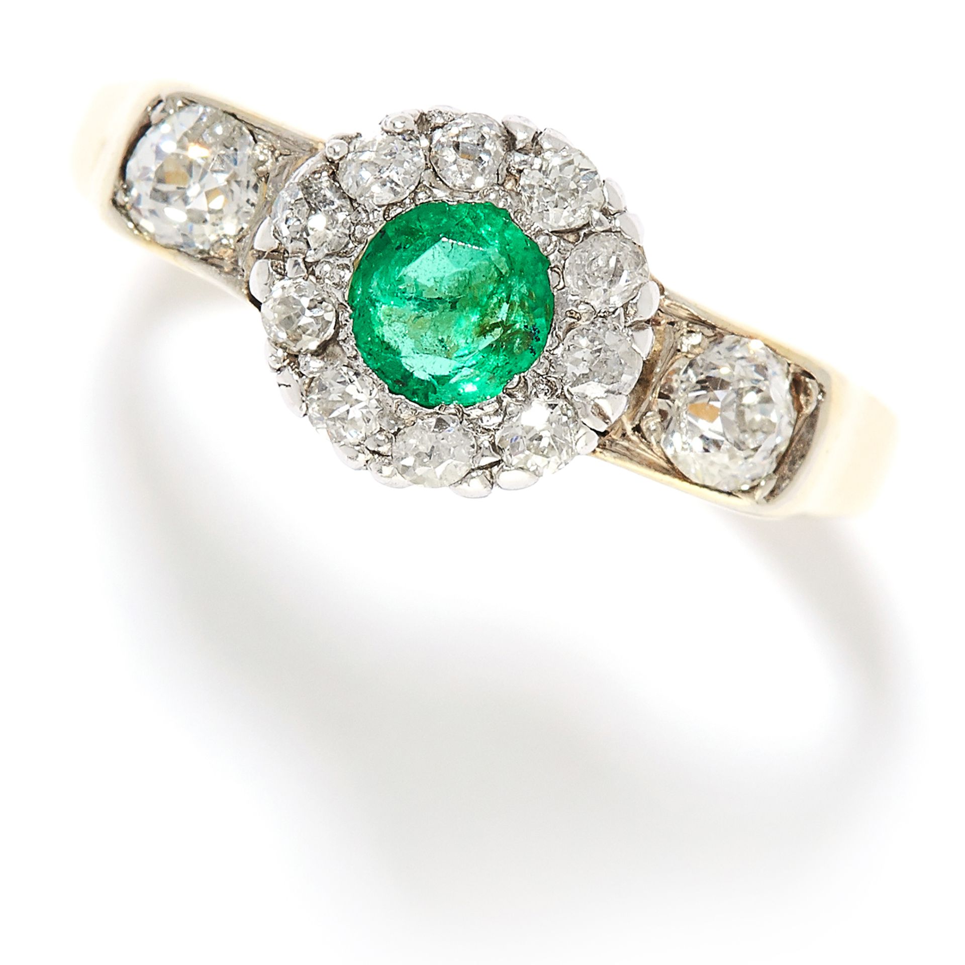 0.85 CARAT EMERALD AND DIAMOND RING in yellow gold, set with a round cut emerald of approximately