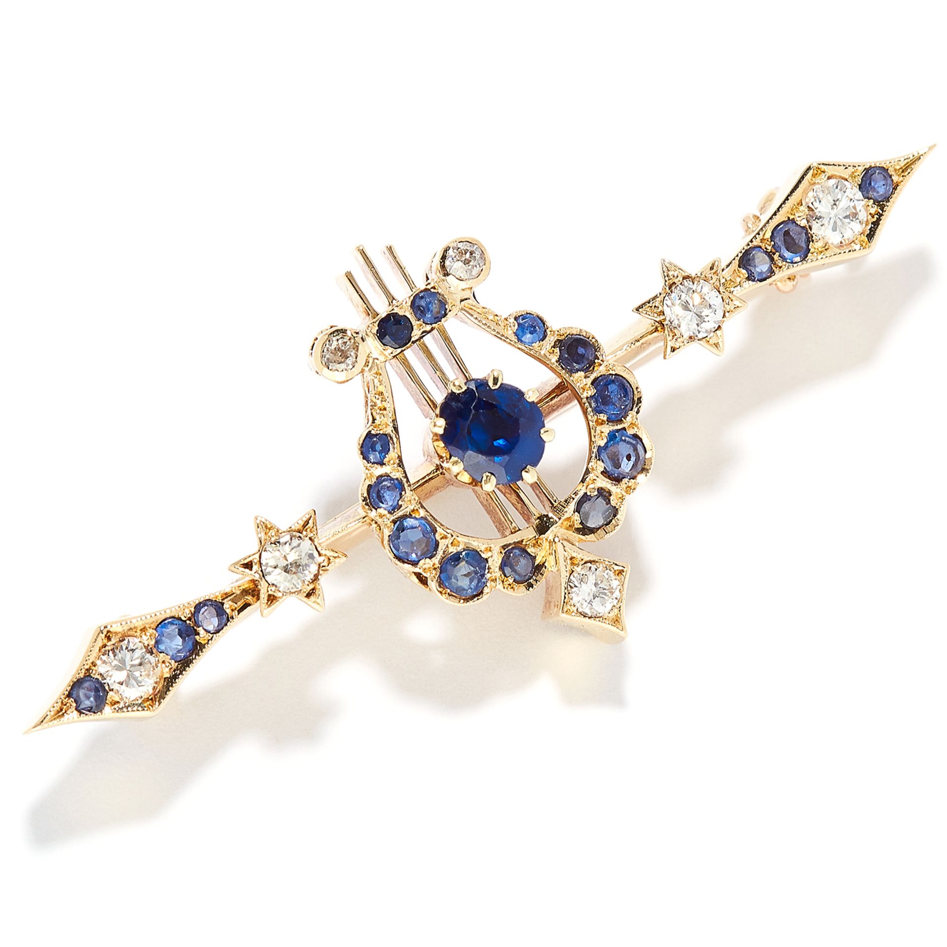 ANTIQUE SAPPHIRE AND DIAMOND BROOCH in 15ct carat yellow gold, the central lyre motif set with round