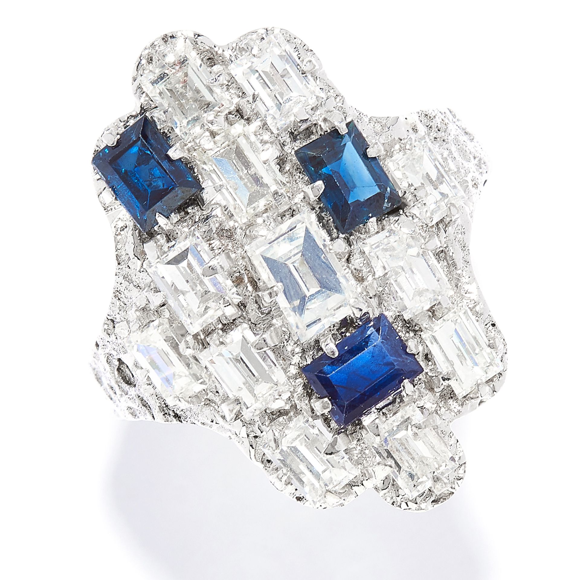 SAPPHIRE AND DIAMOND DRESS RING, CHARLES DE TEMPLE, CIRCA 1960 in 18ct white gold, in abstract