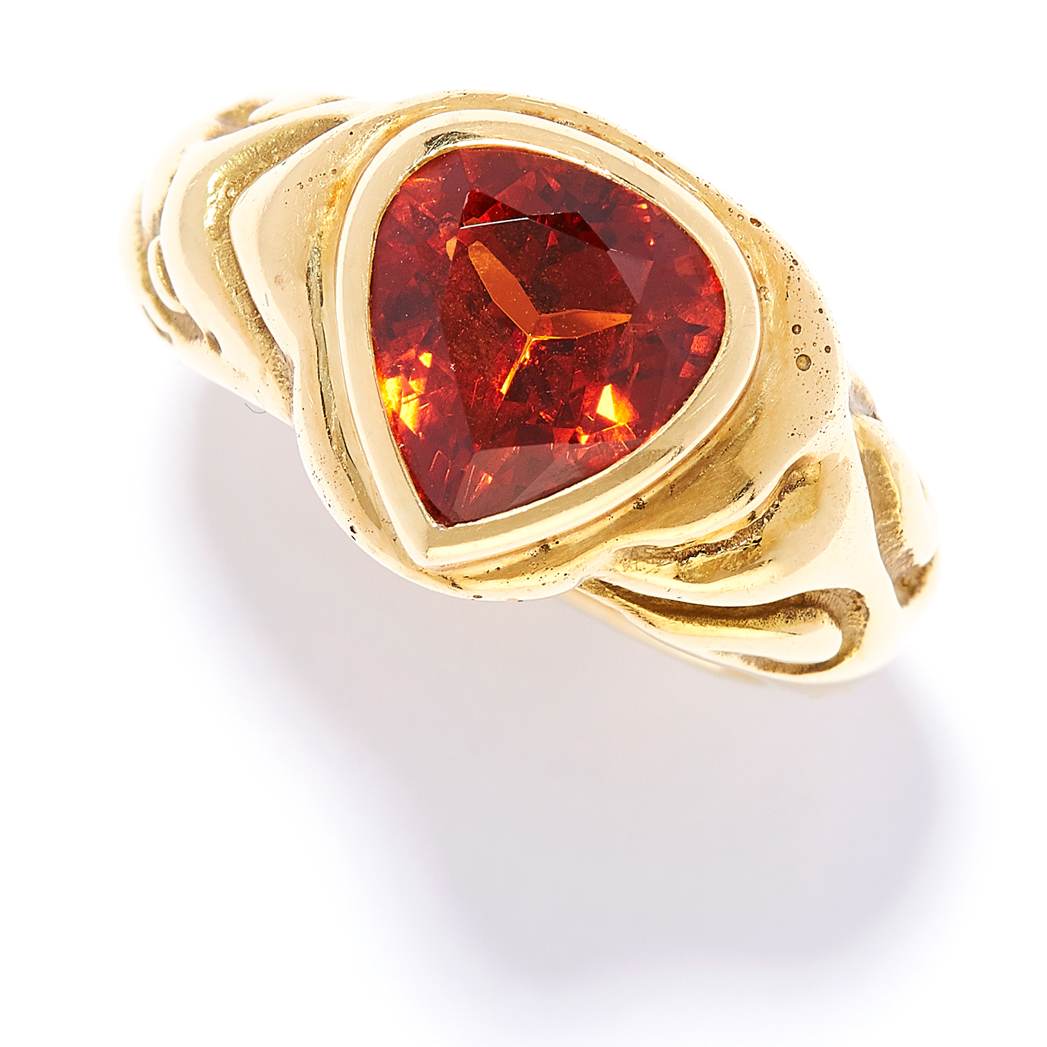 SPESSARTITE GARNET DRESS RING, ELIZABETH GAGE, 1989 in 18ct yellow gold, set with a pear cut