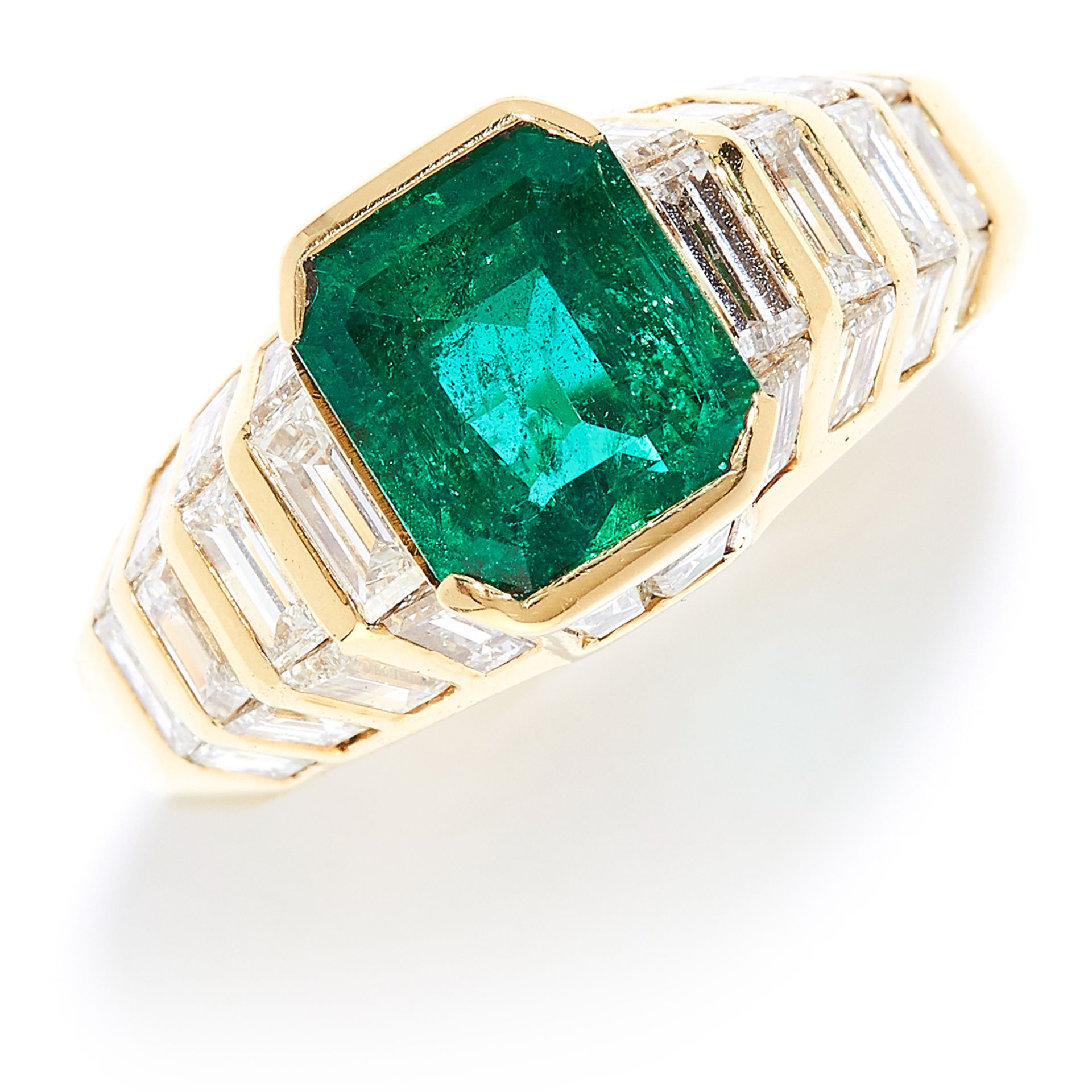 EMERALD AND DIAMOND DRESS RING in high carat yellow gold, set with an emerald cut emerald of 2.14