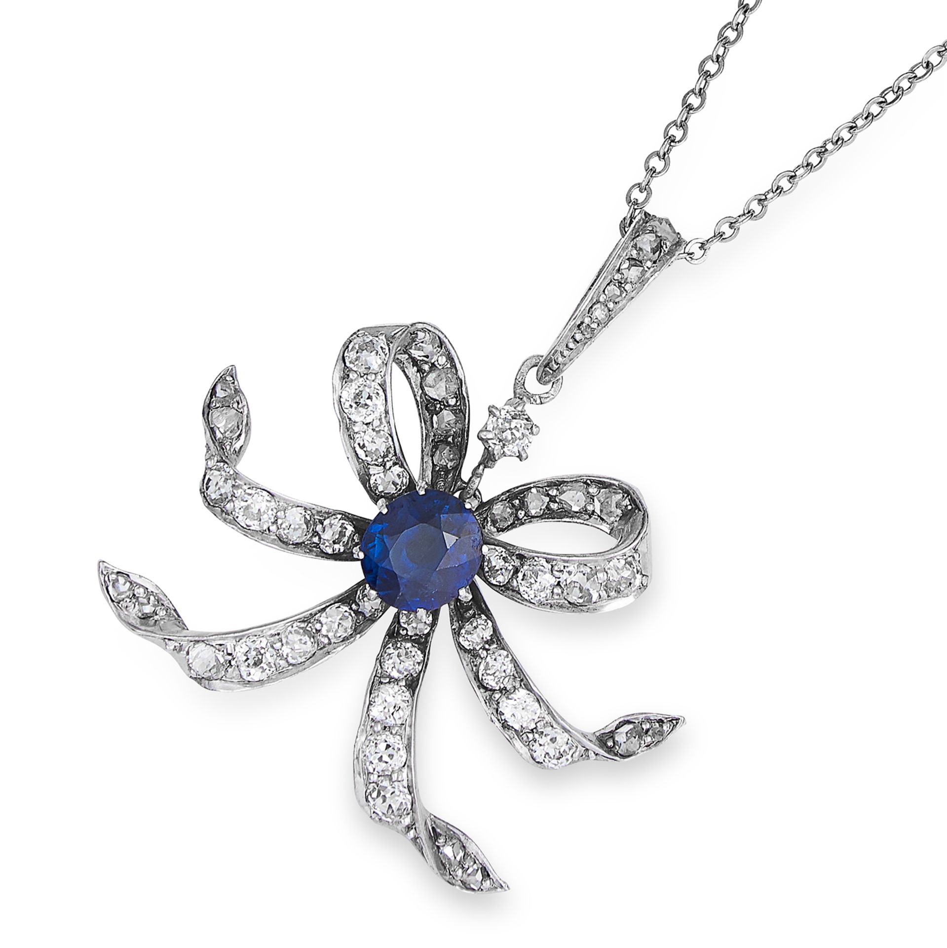 SAPPHIRE AND DIAMOND BOW PENDANT NECKLACE in white gold, the central oval cut sapphire totalling 1.