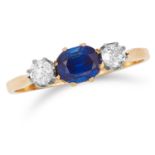 0.82 CARAT SAPPHIRE AND DIAMOND THREE STONE RING in yellow gold, comprising of an oval cut