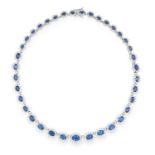 SAPPHIRE AND DIAMOND CLUSTER NECKLACE in 18ct white gold, with thirty seven clusters totalling 20.00