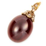 ANTIQUE GARNET AND DIAMOND MOURNING PENDANT in high carat yellow gold, comprising of a cabochon