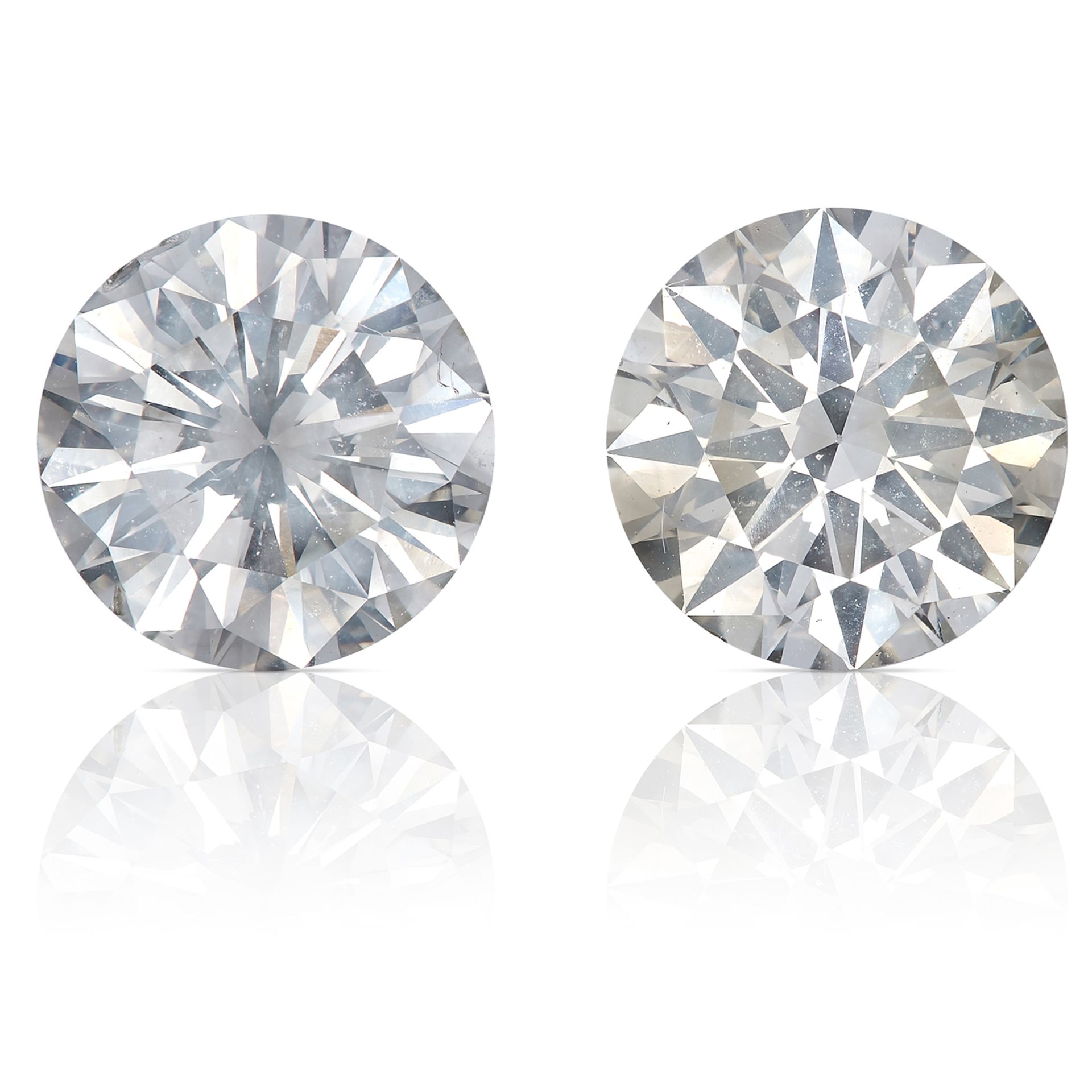 TWO ROUND CUT MODERN BRILLIANT DIAMONDS TOTALLING, 3.13cts, UNMOUNTED.