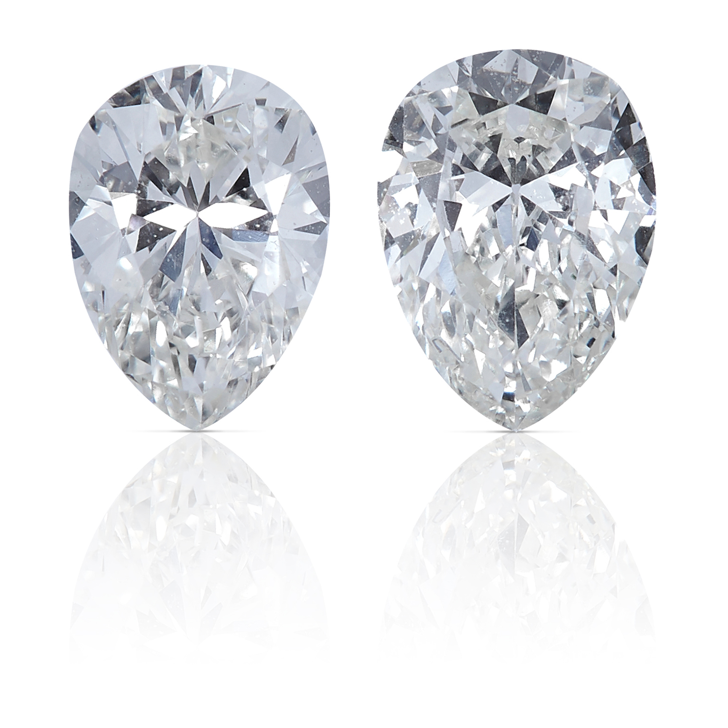 TWO PEAR SHAPED BRILLIANT CUT DIAMONDS, TOTALLING 0.65cts, UNMOUNTED.