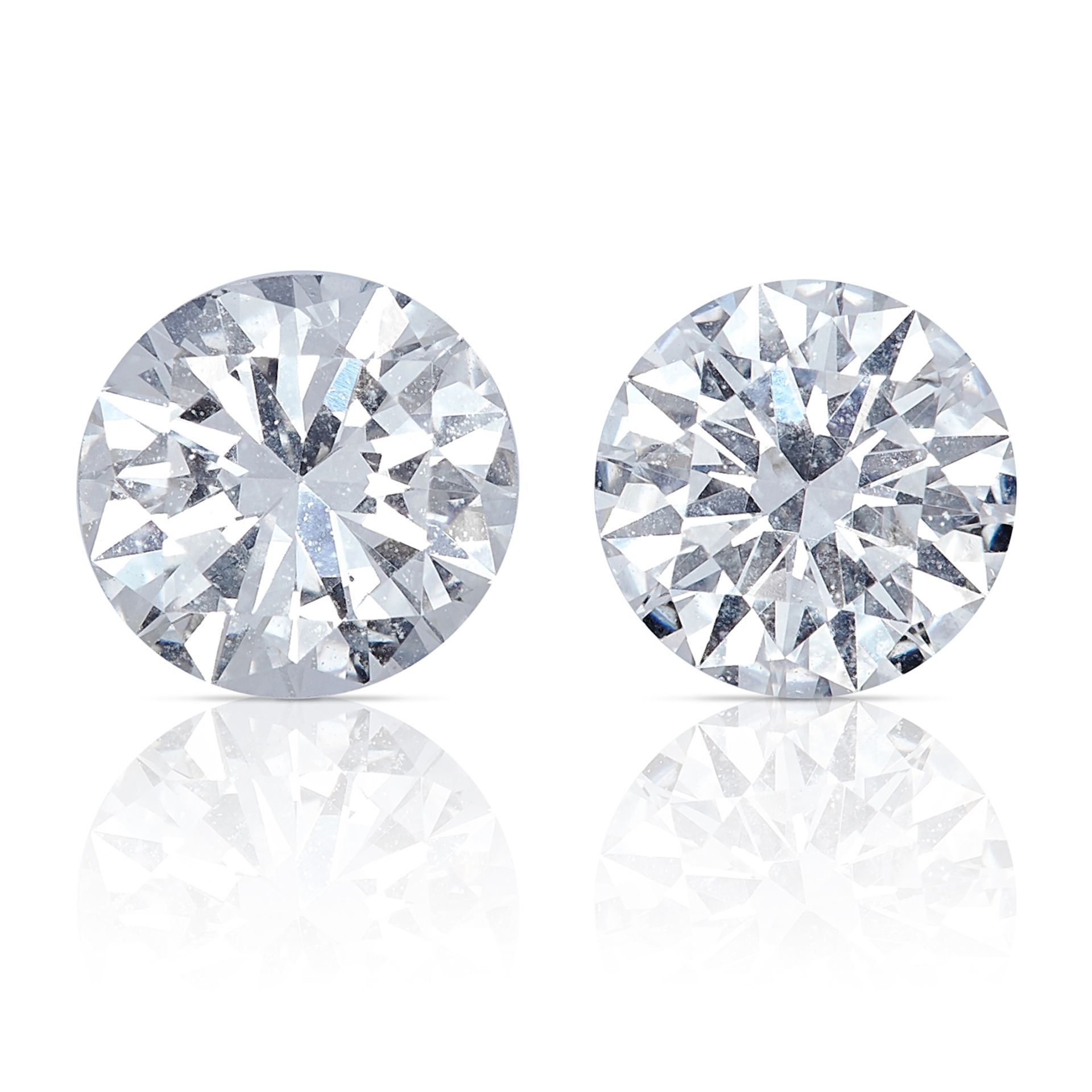 TWO ROUND CUT MODERN BRILLIANT DIAMONDS, TOTALLING 0.71cts, UNMOUNTED.