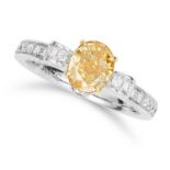 1.07 CARAT FANCY INTENSE YELLOW AND WHITE DIAMOND RING set with an oval cut fancy intense yellow