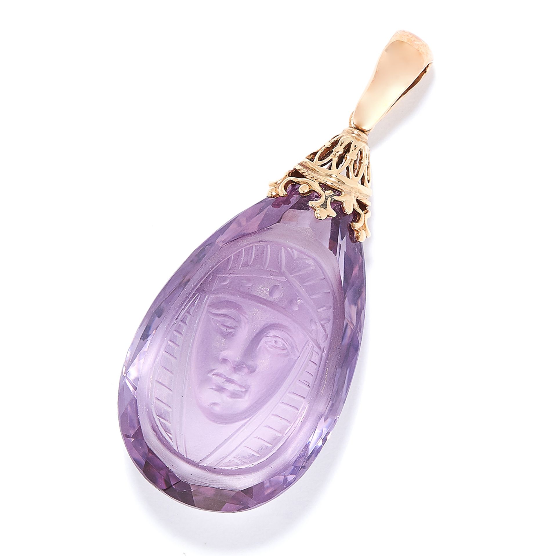 CARVED AMETHYST PENDANT comprising of a carved amethyst drop depicting an Egyptian figure, 3.9cm,