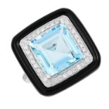 AQUAMARINE, ONYX AND DIAMOND RING in Art Deco design, set with a square cut aquamarine in a border