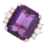 AMETHYST AND DIAMOND RING set with an emerald cut amethyst between round cut diamonds, size O / 7,