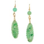 CARVED JADE EARRINGS each set with a jade bead suspending a carved piece of jade, 6.1cm, 4.8g.
