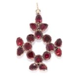 ANTIQUE GARNET PENDANT, 19TH CENTURY in cross motif set with flat cut garnets, 4.1cm, 5.6g.