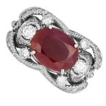 VINTAGE RUBY AND DIAMOND COCKTAIL RING set with an oval cut ruby and round cut diamonds, size M / 6,