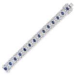 SAPPHIRE AND DIAMOND BRACELET comprising of a row of oval cut sapphires in open framework set with