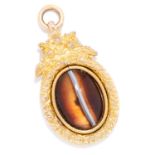 ANTIQUE HARDSTONE PENDANT set with a cabochon hardstone in decorated thistle border, 4.4cm, 7.7g.